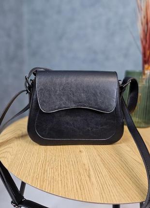 Женская современная сумочка, черного цвета, стильная, имеет 3 ремешка, много отделений