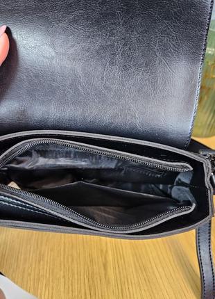 Женская современная сумочка, черного цвета, стильная, имеет 3 ремешка, много отделений10 фото