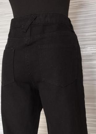 Укороченные черные расклешенные джинсы9 фото