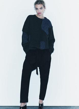 Трикотажный свитер с нашивками