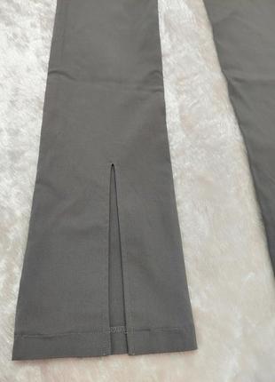 Стильные стрейчевые брюки с высокой посадкой8 фото
