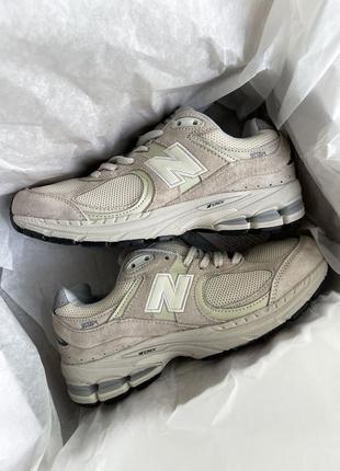 New balance 2002r bone light aluminum1 фото