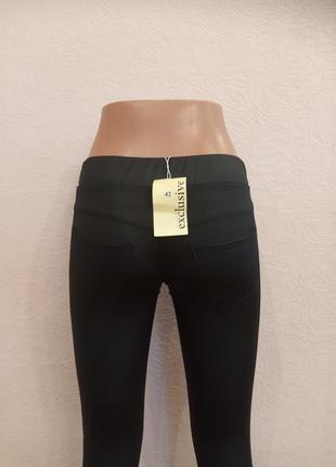 Черные женские брюки -лосины с легким блеском6 фото