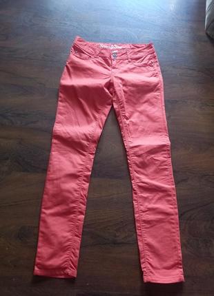 Джинсы женские оранжевые