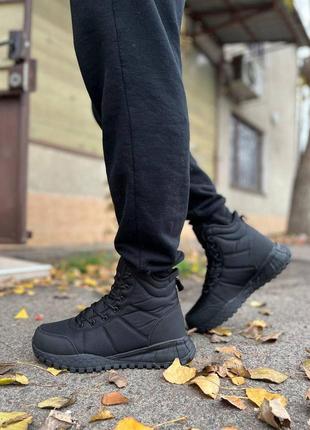 Зимові кросівки для чоловіків у чорному кольорі термо-текстиль та хутро3 фото