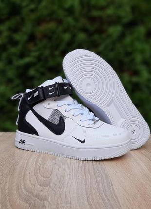 Зимние женские кроссовки nike air force 1 high winter white black fur белого с черными цветами с мехом6 фото