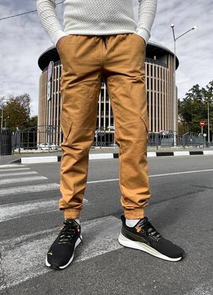 Якісні чоловічі джогери спортивні штани з бічними кишенями преміум1 фото