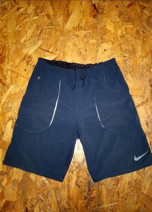 Спортивні вінтажні еластичні софтшельні шорти nike fit dry vintage