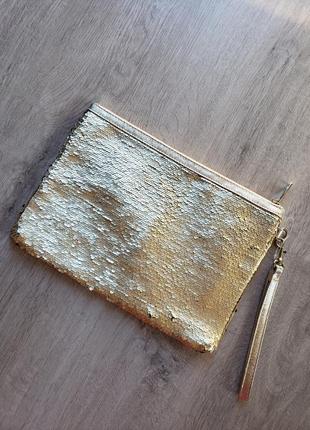 Клатч  dorothy perkens  з пайєток золото-чорного  кольору.