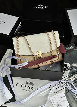 Жіноча шкіряна сумка 👜 coach lane shoulder bag in colorblock signature canvas1 фото