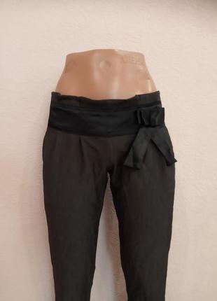 Темно-сірі жіночі брюки зі штучної костюмної тканини з атласним бантиком