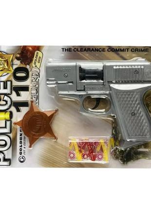 Іграшковий пістолет з пістонами та значком "commando" golden gun 283gg