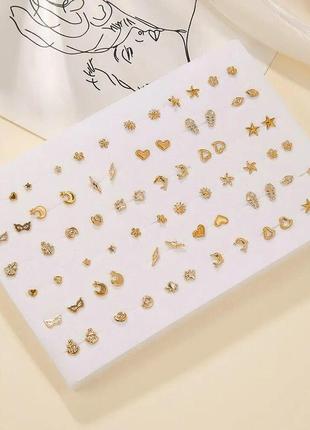 Сережки геометрические 36 пар в наборе золотого цвета пусеты гвоздики разной формы