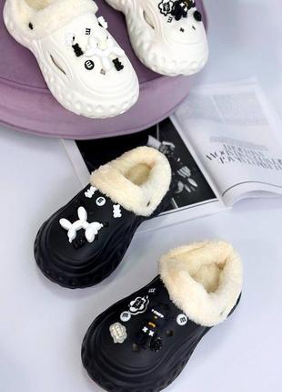 Гумові тапки. утеплені хутром, на масивній підошві.