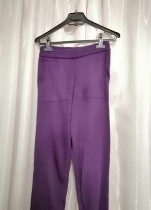 В'язані штани висока посадка з боків з кишенями темно-фіолетового кольору етикеток складом тканини н2 фото