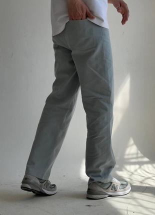 Стильні об'ємні чоловічі джинси світло-сірі котон6 фото