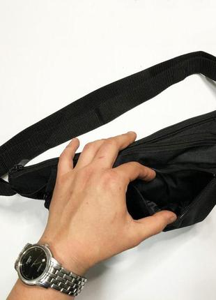 Качественная и надежная тактическая сумка-бананка из прочной и водонепроницаемой ткани черная iy-897 через4 фото