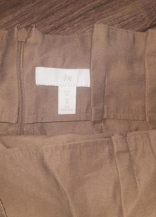 Бежевая юбка с карманами (карго) и пояском5 фото
