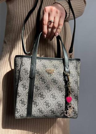 Жіноча сумка з еко-шкіри  сірого кольору молодіжна, брендова сумка через плече