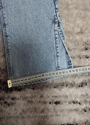 Женские джинсы arox с распорками и разрезами8 фото
