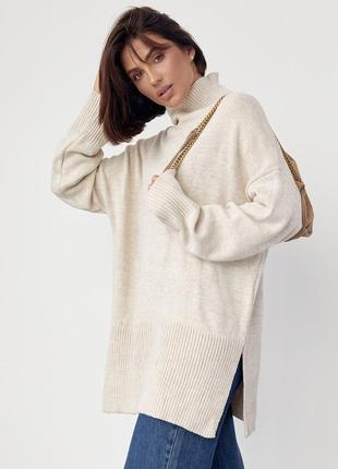 Женский вязаный свитер oversize с разрезами по бокам