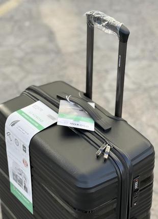 Качественный чемодан из полипропилен, гибкий мягкий материал на котором можножно прыгать6 фото