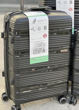 Качественный чемодан из полипропилен, гибкий мягкий материал на котором можножно прыгать2 фото