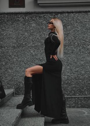 Женское черное облегающее длинное платье из фактурного трикотажа с вырезом на ноге 20235 фото