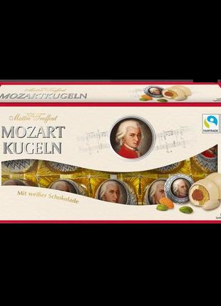 Шоколадные марципановые конфеты в белом шоколаде  mozart kugeln, 200г (австрия)1 фото