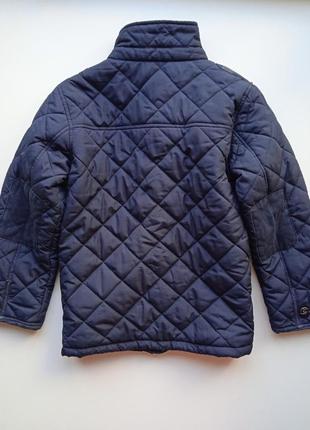 Темно -синя демісезонна стьогана куртка next 128 см3 фото