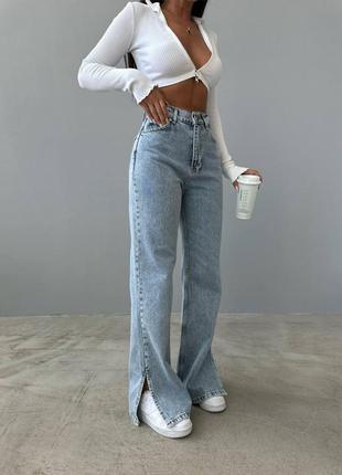 Женские прямые светлые джинсы палаццо,женскоепрямое светлые джинсы палаццо с разрезами, с разрезами1 фото