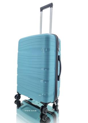 Дорожный пластиковый полипропиленовый чемодан средний м voyage super me на 4-х колесах бирюзовый