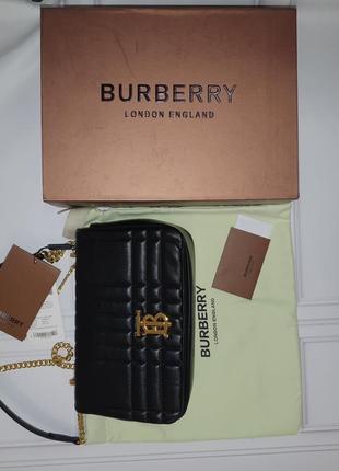 Женская кожаная сумка в стиле burberry6 фото