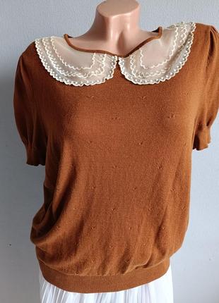 Трикотажна блуза з мереживним коміром.1 фото