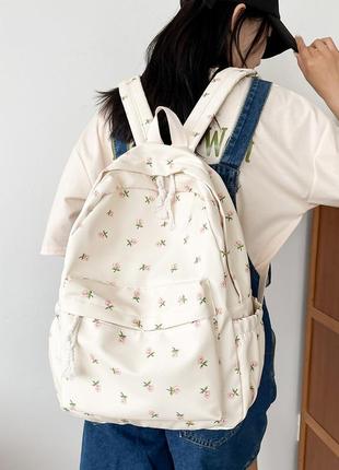 Шкільний рюкзак із квітами для дівчинки стильний гарний зручний місткий бежевого кольору8 фото