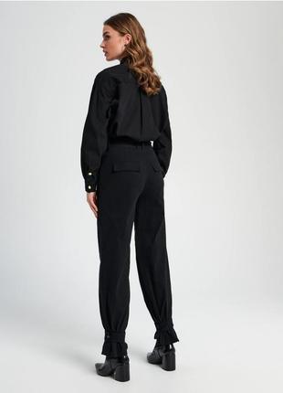 Штани чорні, з ременем2 фото