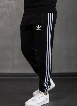 Чоловічі зимові спортивні штани adidas чорні з лампасами брюки адідас на флісі (bon)