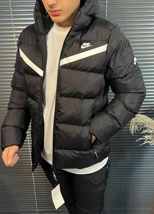 Куртка зимняя nike, с капюшоном.1 фото