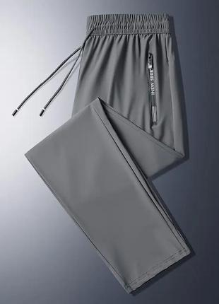 Прямые спортивные штаны женские и мужские материал очень легкий, быстро сохнет серые размер xl