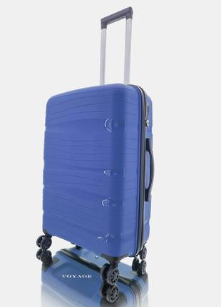Дорожный пластиковый полипропиленовый чемодан средний м voyage super me на 4-х колесах синий1 фото