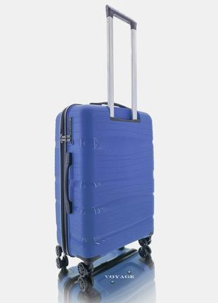 Дорожный пластиковый полипропиленовый чемодан средний м voyage super me на 4-х колесах синий3 фото