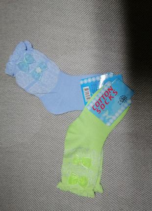 Тоненькі нові шкарпетки на дівчинку.1 фото