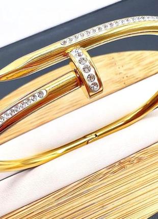 Гіпоалергенний позолочений браслет цвях з лого з медичної сталі (stainless steel)