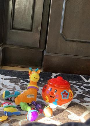 Нові розвиваючі  іграшки комплект lamaze для малюка chicco музикальні10 фото