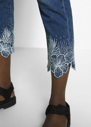 Женские джинсы с камушками5 фото