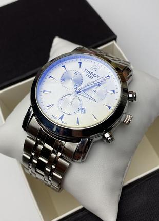 Кварцовий наручний годинник для чоловіка у срібному кольорі1 фото