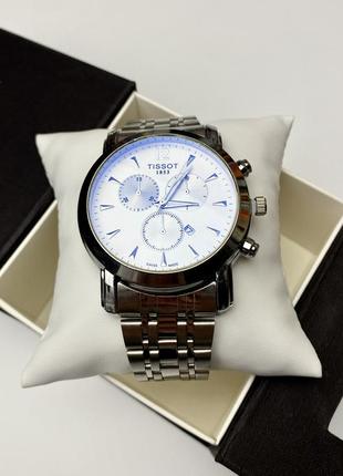 Кварцовий наручний годинник для чоловіка у срібному кольорі8 фото