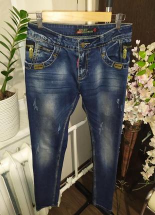 Стильные джинсы мом3 фото