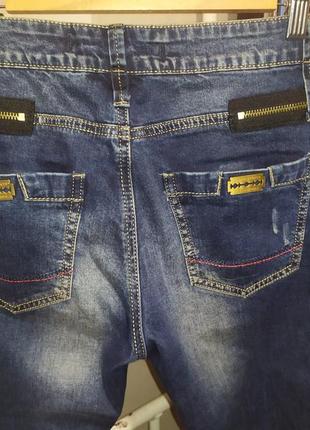 Стильные джинсы мом5 фото