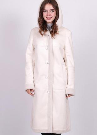 Дублянка жіноча молочна довга, з двома кишенями з боків і поясом дубляж капюшон хутро,...